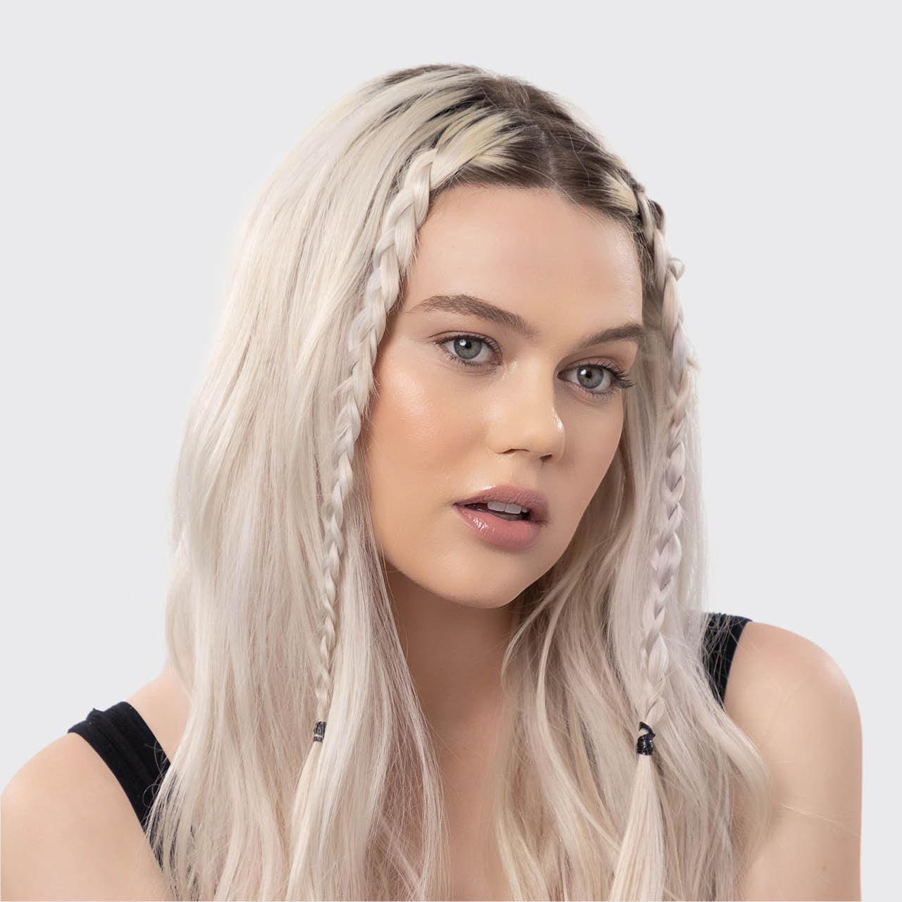 KITSCH Black No-Snag Elastics 100pc Set — model shot — model wearing black elastics in an updo, no-damage grip