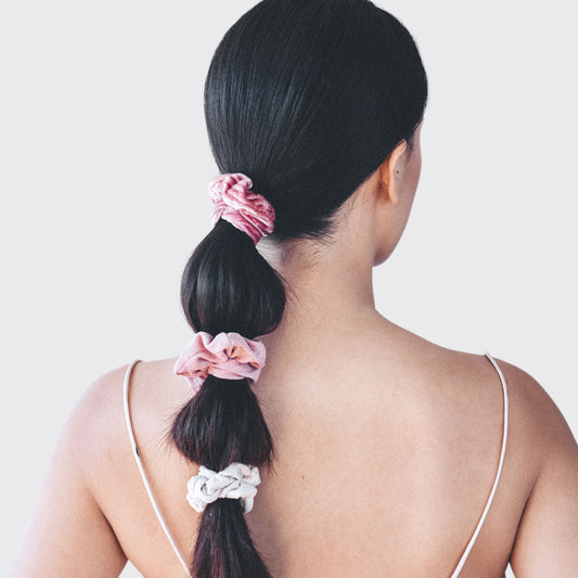 KITSCH Blush & Mauve Velvet Scrunchies 5pc Set — lifestyle shot of blush and mauve velvet scrunchies styled in hair — plush velvet fabric gentle on all hair types