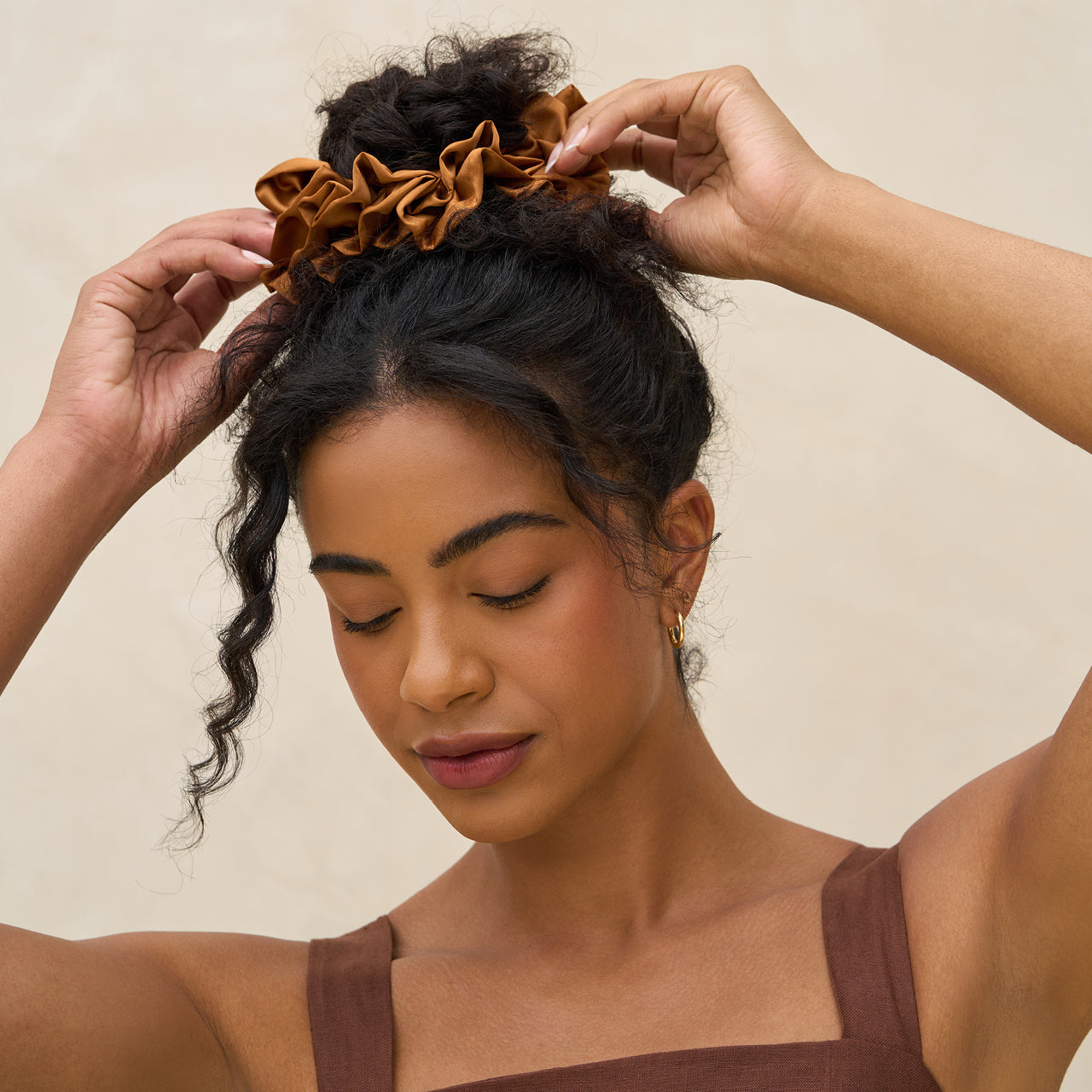 KITSCH Camel Ruffle Scrunchie — model with camel ruffle scrunchie in hair — eco-friendly recycled fabric with a voluminous ruffle for effortless warm-toned style