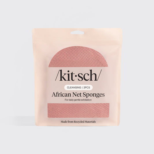 Kitsch Berry Pink African Net Sponge folded inside branded packaging showing the product label.
