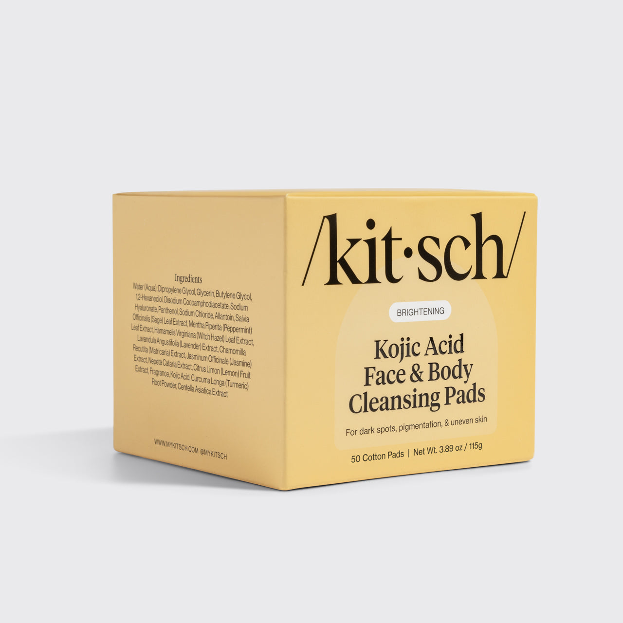 KITSCH Kojic Acid Face & Body Cleansing Pads — retail packaging box angled view on light gray background showing front and ingredient side — BRIGHTENING | For dark spots, pigmentation, & uneven skin — 50 Cotton Pads | Net Wt. 3.89 oz / 115g — Centella Asiatica (Cica) strengthens and repairs the skin barrier — Supports elasticity and reduces fine lines