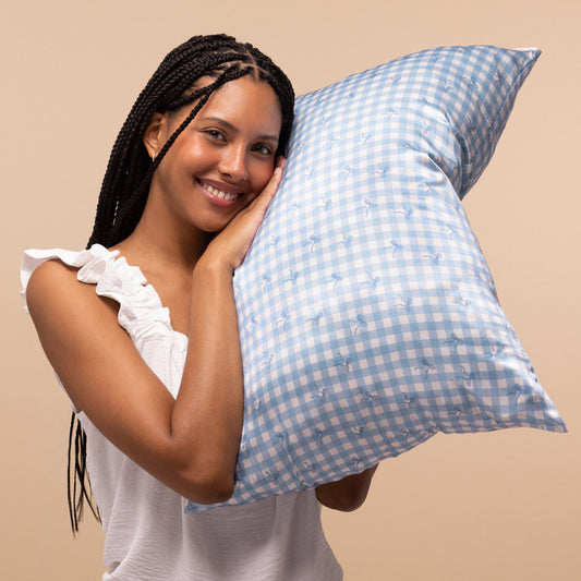 KITSCH Gingham Blue Standard Satin Pillowcase — Model sleeping on pillowcase
