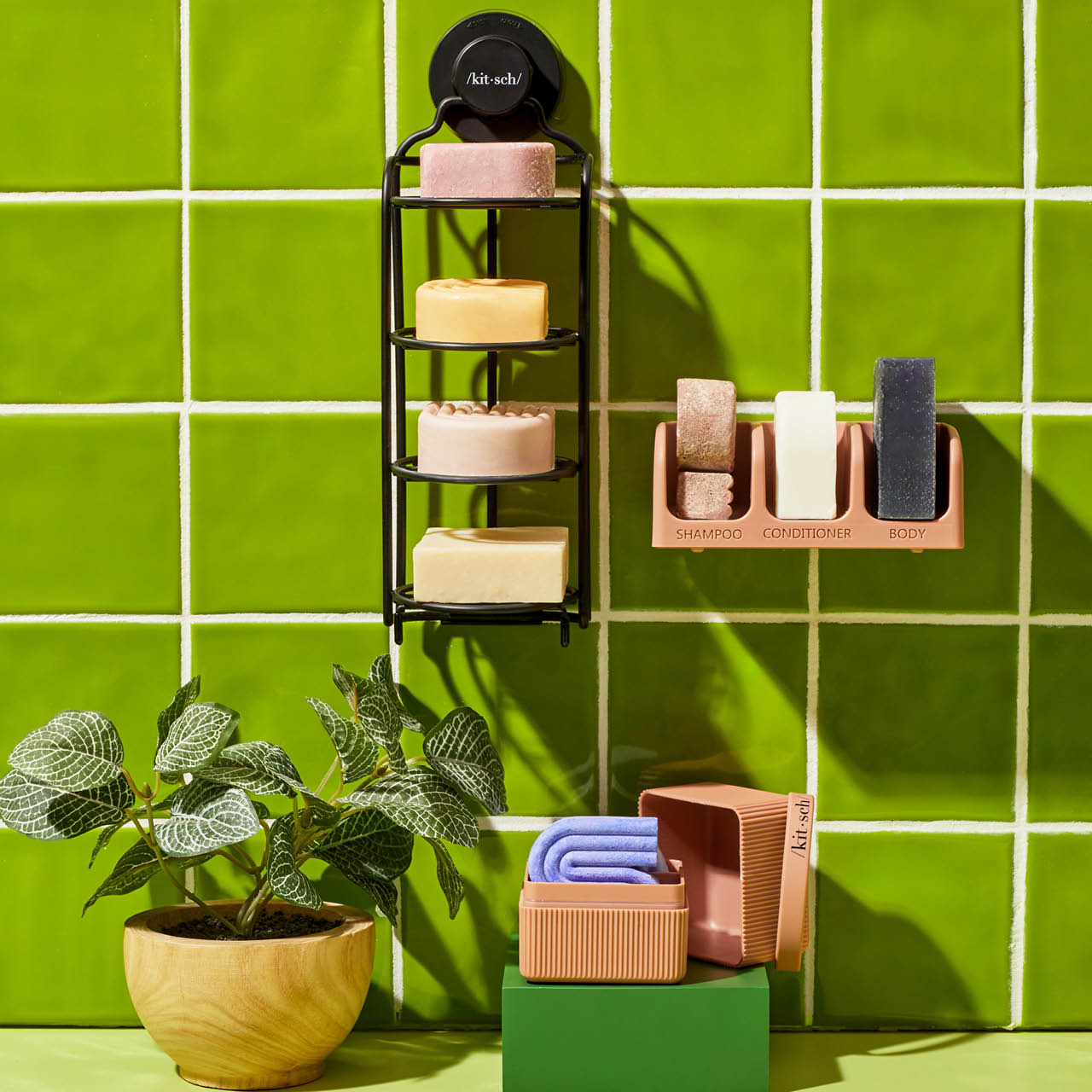 Kitsch Self-Draining Shower Caddy styled in a clean modern bathroom with bar soaps and accessories