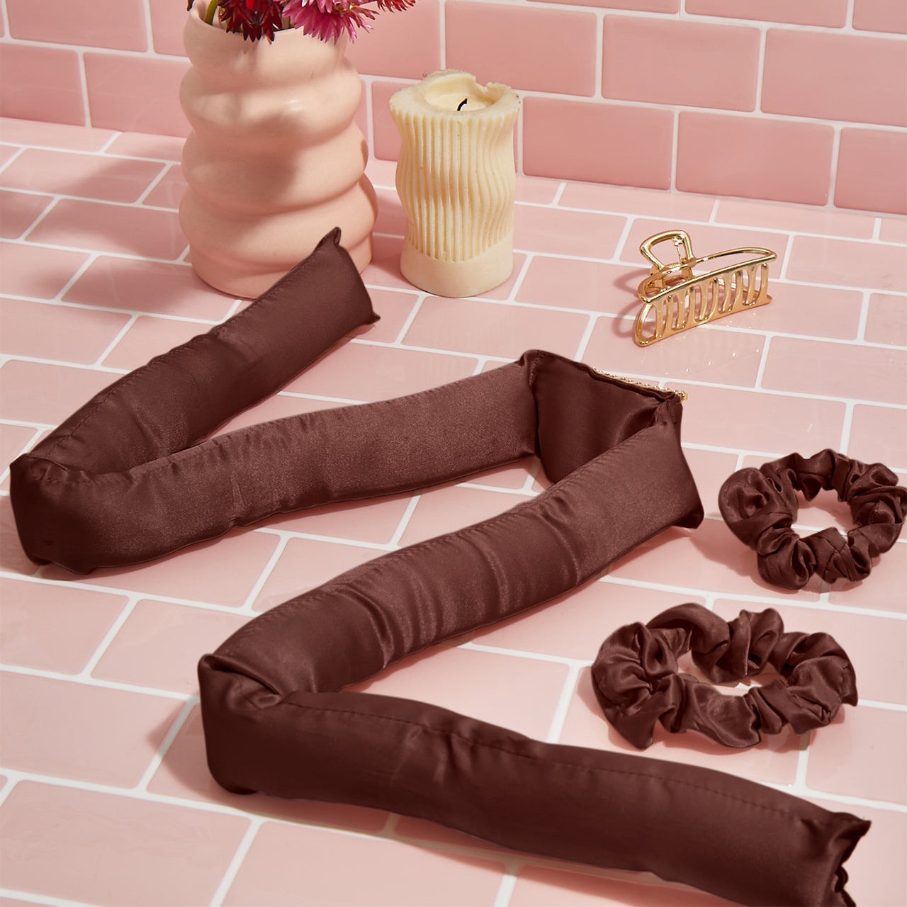 Chocolate XL Satin Heatless Curling Set with satin curling rod and matching scrunchies arranged with hair accessories.