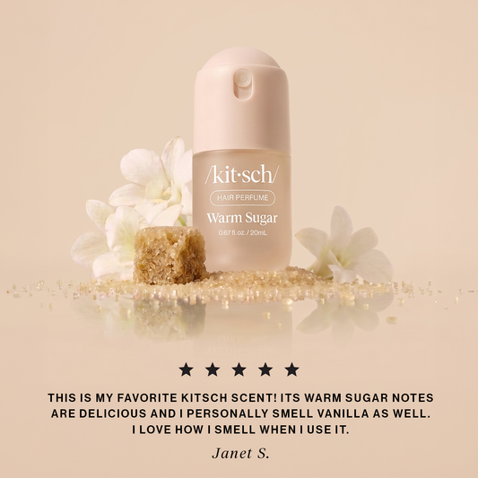 KITSCH Warm Sugar Mini Hair Perfume 5-star review image — cream spray bottle with white blooms and a raw sugar cube — quote from Janet S.: this is my favorite Kitsch scent, warm sugar notes are delicious and I love how I smell when I use it