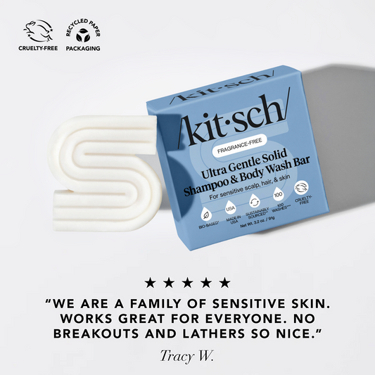kitsch ultra gentle solid shampoo & body wash bar with packaging on a light gray background with a 5-star customer review at the bottom that reads "We are a family of sensitive skin. Works great for everyone. No breakouts and lathers so nice"