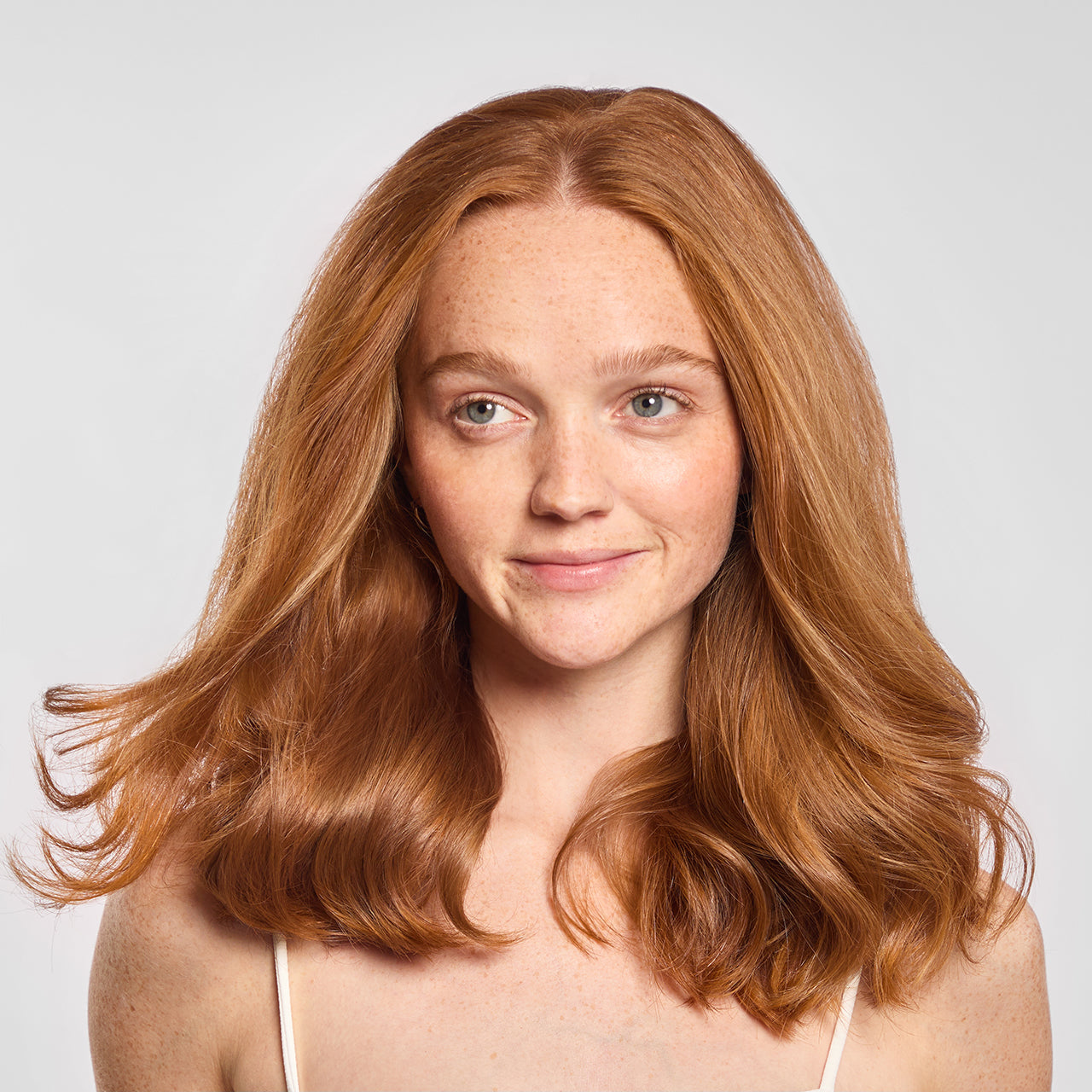 After results from Hair By Chrissy x Kitsch Ceramic Thermal Rollers — model with full, bouncy curls and volume