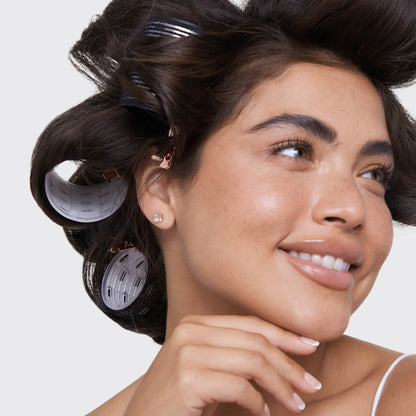 Kitsch Ceramic Thermal Rollers in use — model setting bouncy waves and lift using the 8pc set