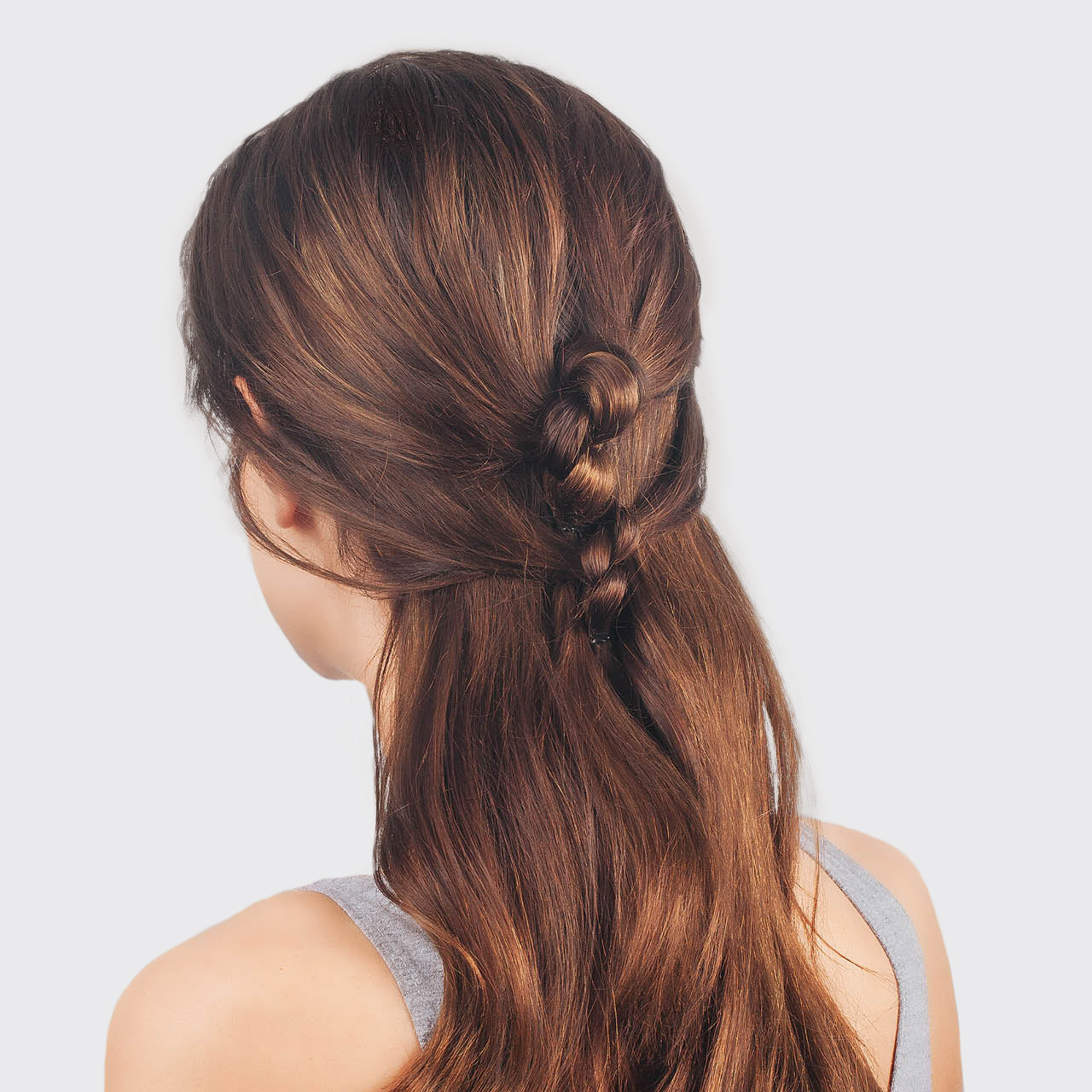 KITSCH Black No-Snag Elastics 100pc Set — model shot — black elastics used to style hair in a sleek, snag-free look