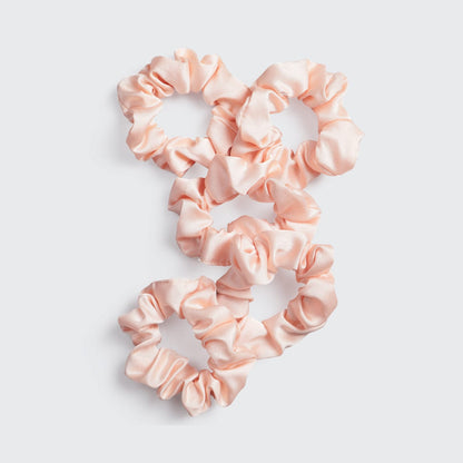KITSCH Satin Sleep Scrunchies in Blush — product shot of blush pink satin sleep scrunchie — silky satin won't crimp or agitate hair while you sleep