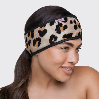 KITSCH Microfiber Spa Headband in Leopard — lifestyle shot of leopard spa headband during beauty routine — soft microfiber fabric stays gentle on hair