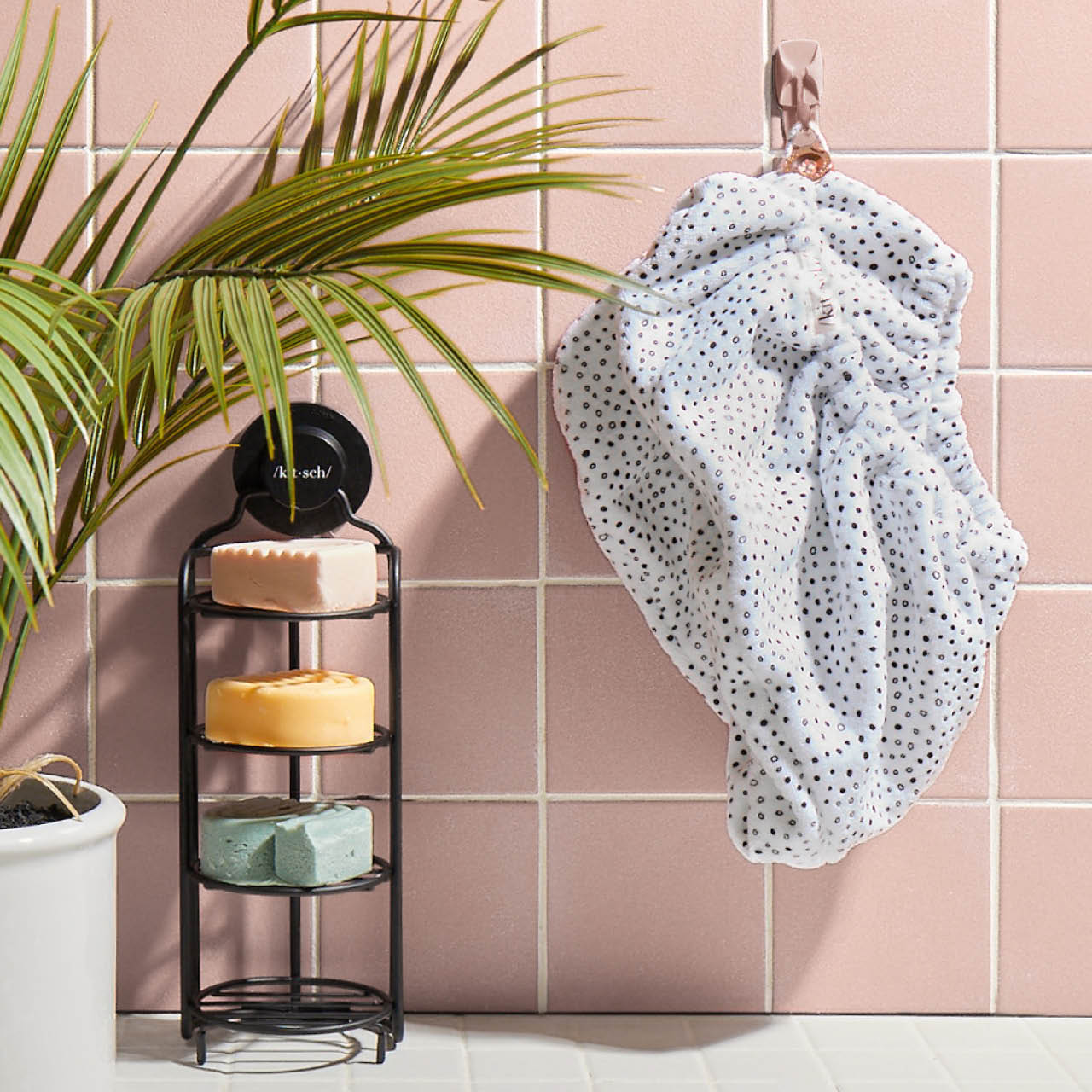 Kitsch Microfiber Hair Towel in Micro Dot displayed alongside Kitsch hair care products, showcasing an everyday hair care routine.