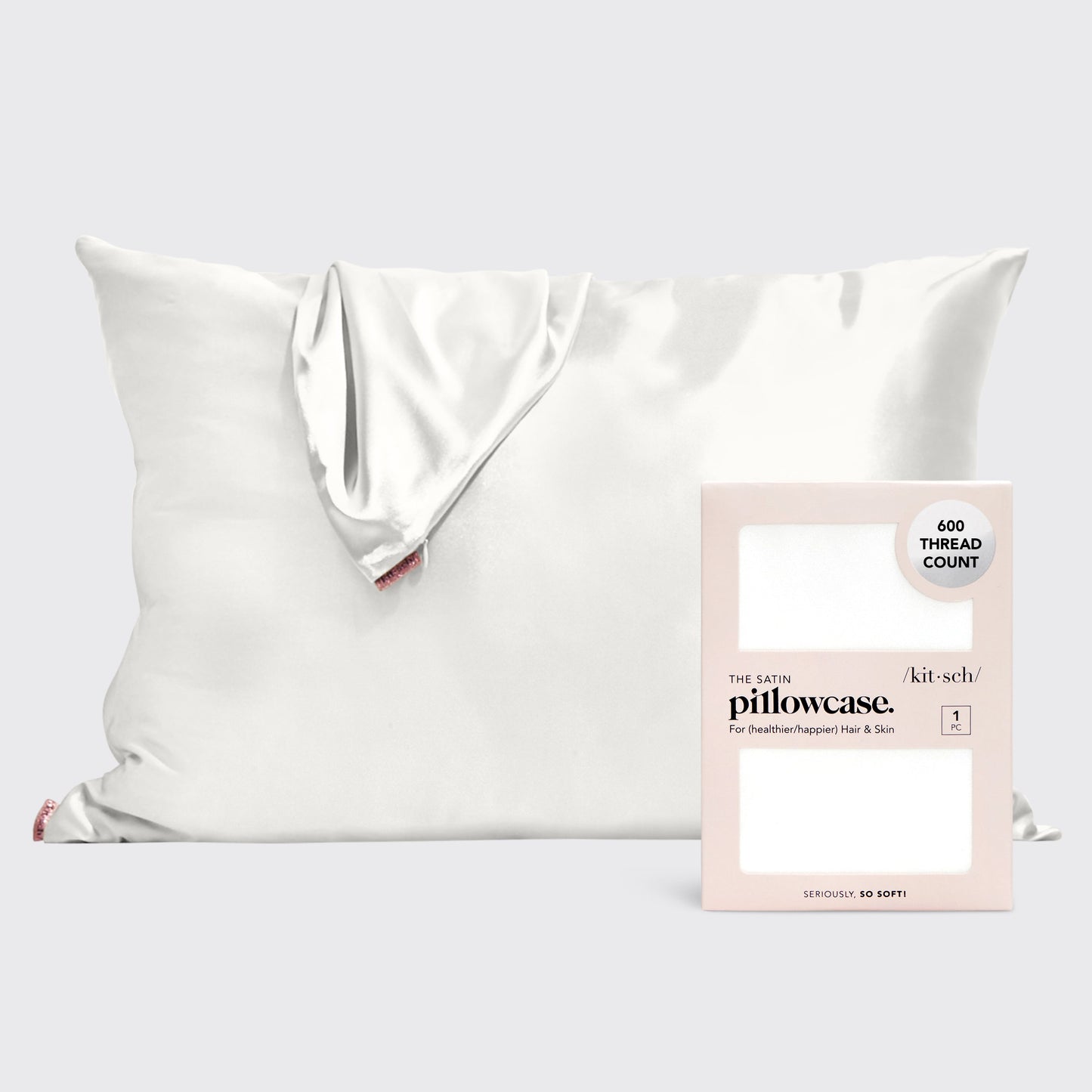 KITSCH Ivory Standard Satin Pillowcase — hero shot — smooth ivory satin surface