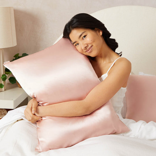 Detail close-up of Kitsch Blush Satin Pillowcase showing smooth, hair-friendly satin texture