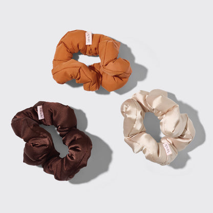 KITSCH Sedona Cloud Scrunchies 3pc Set — product flat lay of 3 Sedona cloud scrunchies — terracotta, rust, and warm brown tones made from eco-friendly recycled fabric