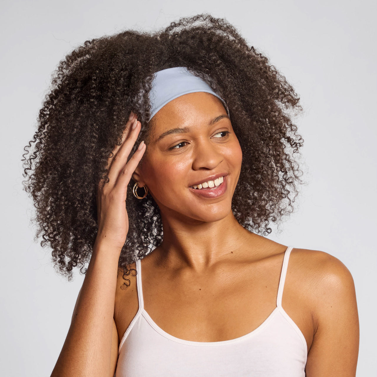 KITSCH Garden Bouquet Active Headbands 3pc Set — model wearing garden bouquet active headband — keeps hair and flyaways out of face with a clean, polished finish