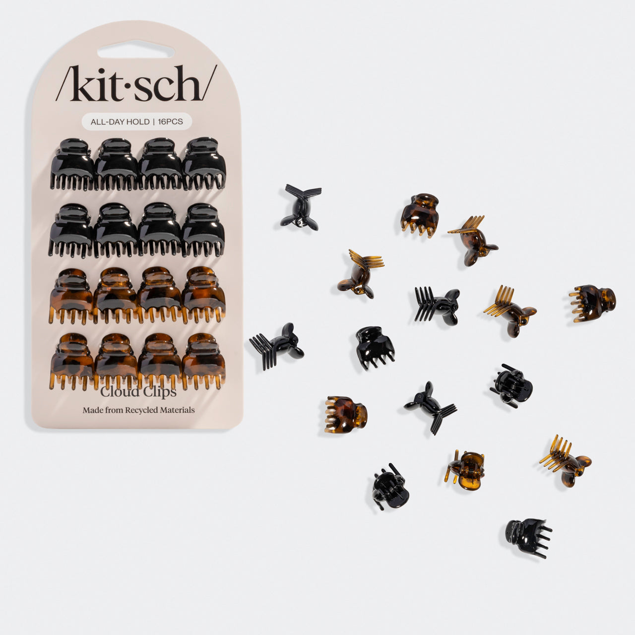 Kitsch Black & Tort Micro Cloud Clip Set packaging with multiple clips scattered on a light grey background