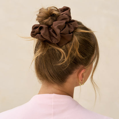 KITSCH Black & Chocolate Oversized Scrunchies — model styling hair with scrunchie — Adds playful volume and instant style to any ponytail or bun — perfect for casual, work, or photo-ready looks