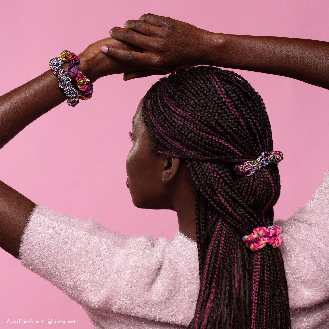 KITSCH Lisa Frank x Kitsch Ruched Satin Scrunchies in Rainbow Leopard — model with rainbow leopard ruched satin scrunchie updo — Lisa Frank x KITSCH limited-edition collab design