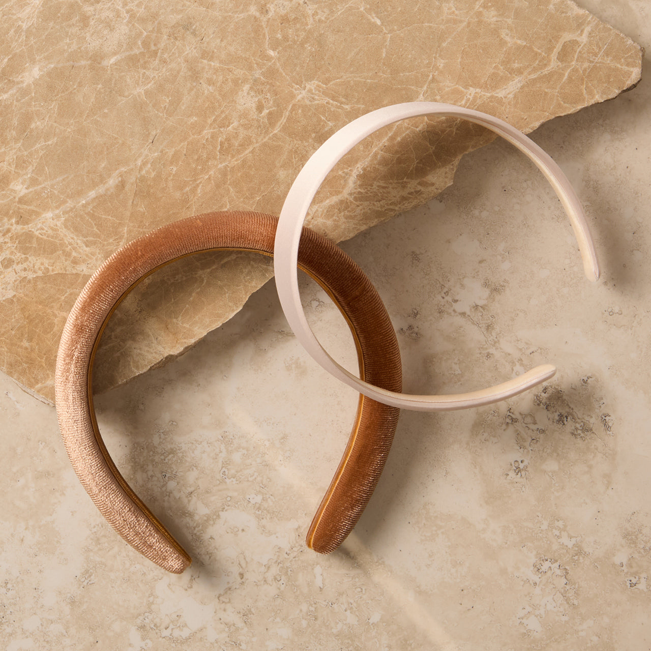 KITSCH Cream & Camel Satin & Velvet Headbands — creative product flat lay of cream and camel headband set — cream and camel hues pair effortlessly with any outfit