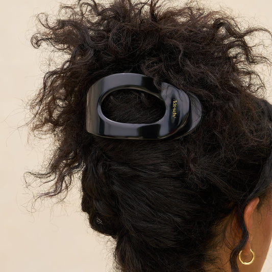 KITSCH Black Flat Cloud Clip Large — model hair shot, styled updo