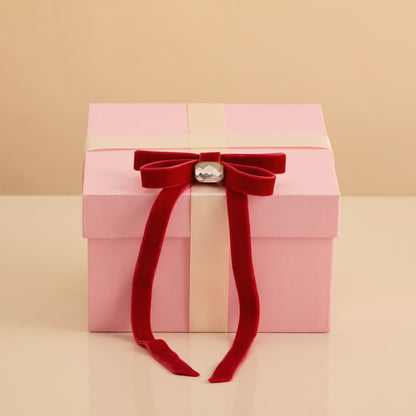 KITSCH Velvet Gemstone Bow Hair Clip Red — creative product shoot