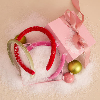 KITSCH Red, Pink & Green Velvet Headbands — creative product shoot of red, pink, and green velvet headbands — plush velvet adds a touch of cozy elegance