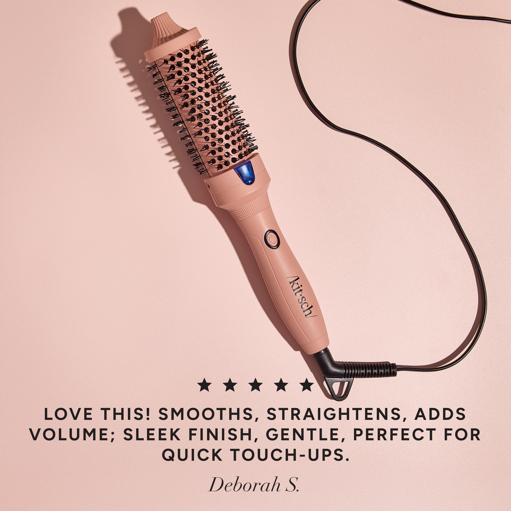 Image of the Terracotta Thermal Brush on a solid light pink background with a review on the bottom of the image that reads "love this! smooths, straightens, adds volume; sleek finish, gentle, perfect for quick touch-ups" by Deborah S.