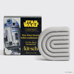KITSCH x Star Wars™ Rice Water Protein Solid Conditioner Bar — R2-D2 edition — STRENGTHENING formula For thin, fine, & damaged hair — silver-grey S-shaped solid conditioner bar beside black and white Star Wars gift box featuring R2-D2 artwork — /kit·sch/ — Net Wt. 2.7 oz / 77g