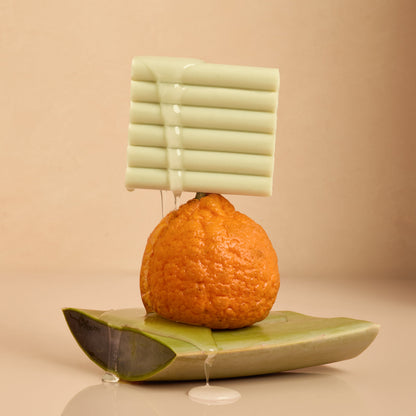 KITSCH Glycolic Acid Resurfacing Face and Body Wash — close-up of bar texture and lather — Aloe-infused hydration soothes and minimizes irritation, delivering a non-stripping cleanse — sustainable and travel-friendly—no plastic, no spills