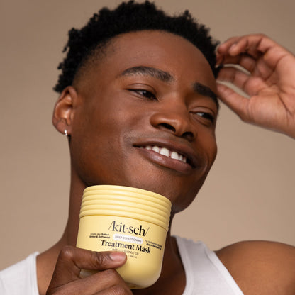 Model with defined, hydrated curls using KITSCH Coconut Oil Deep Conditioning Treatment Mask