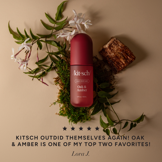 Kitsch Oak & Amber Hair Perfume bottle styled with warm amber and woody accents on a soft background