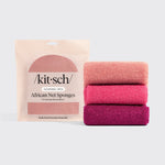 Berry Pink African Net Sponge set with folded pink exfoliating body sponge cloths and Kitsch packaging on a white background.