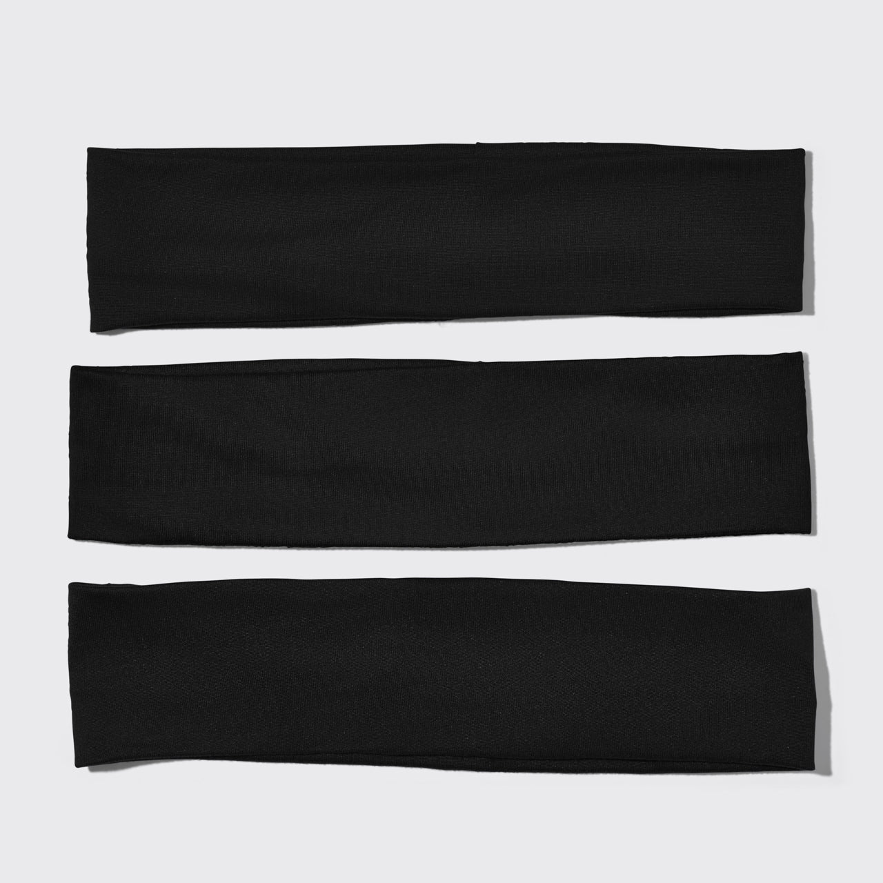 KITSCH Black Active Headbands — Set of 3 black Recycled Fabric Active Headbands, ribbed knit, stacked on white background