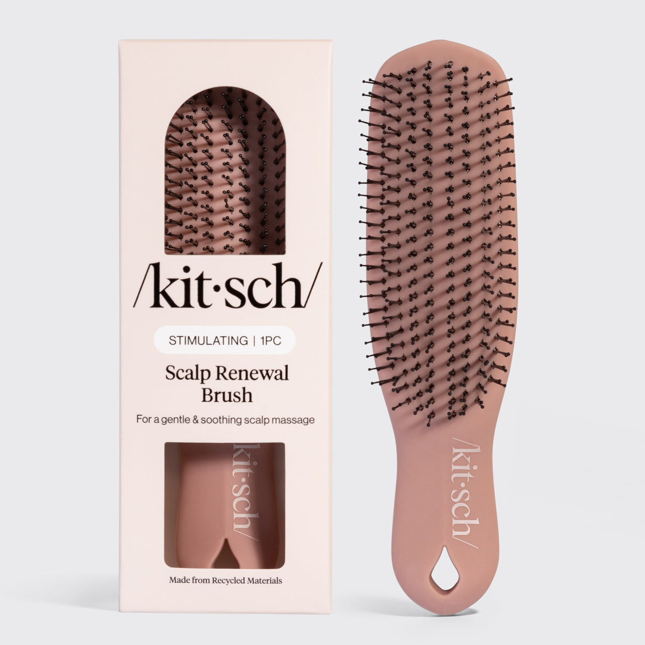 Terracotta Kitsch Scalp Renewal Brush on a neutral background