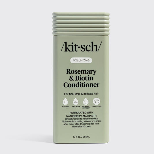 Kitsch Rosemary & Biotin Conditioner bottle on a gray background