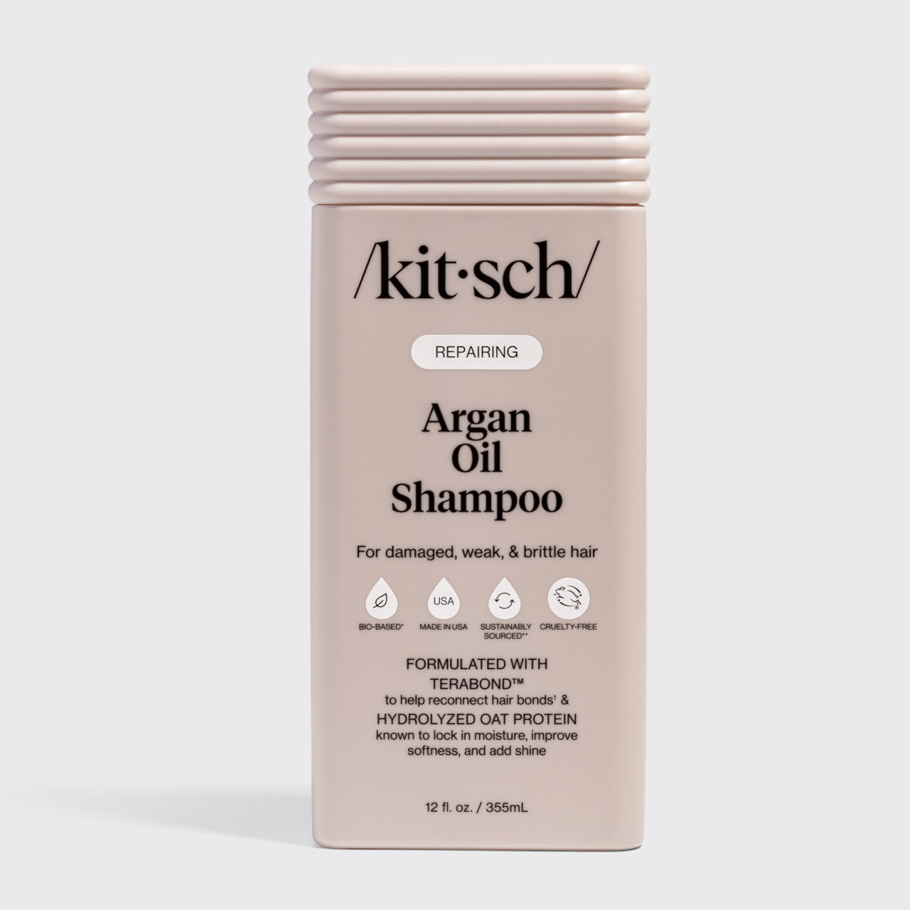 KITSCH Repairing Argan Oil Shampoo 12 fl. oz. — labeled REPAIRING, For damaged, weak, & brittle hair — icons: Bio-Based, Nontoxic, Sustainably Sourced, Cruelty-Free — Formulated with Terabond™ to help reconnect hair bonds & Hydrolyzed Oat Protein to lock in moisture, improve softness, and add shine