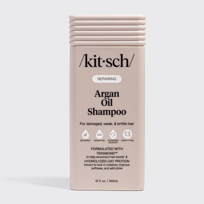 KITSCH Repairing Argan Oil Shampoo 12 fl. oz. — labeled REPAIRING, For damaged, weak, & brittle hair — icons: Bio-Based, Nontoxic, Sustainably Sourced, Cruelty-Free — Formulated with Terabond™ to help reconnect hair bonds & Hydrolyzed Oat Protein to lock in moisture, improve softness, and add shine