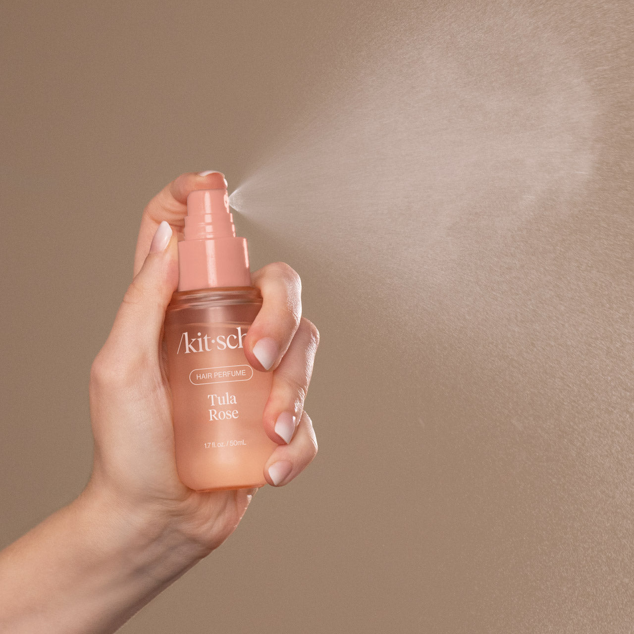 Model with Kitsch Tula Rose Hair Perfume — soft floral hair fragrance