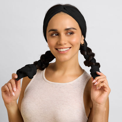 KITSCH Set & Flow Active Headband in Black — lifestyle model shot with set & flow headband for active wear — keeps hair back without creasing or pulling