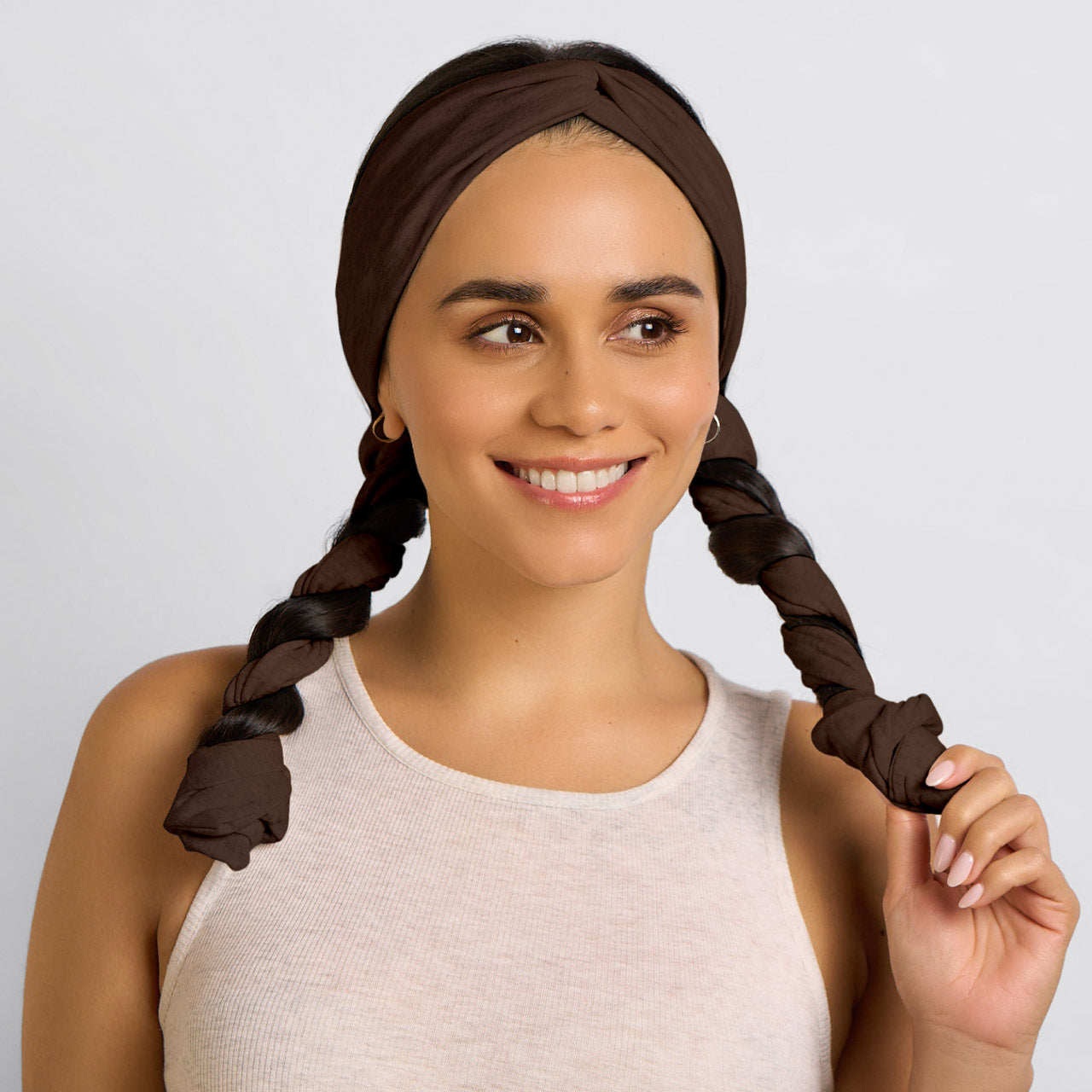 KITSCH Set & Flow Active Headband in Chocolate Brown — lifestyle model shot with chocolate brown set & flow headband for active wear — keeps hair back without creasing