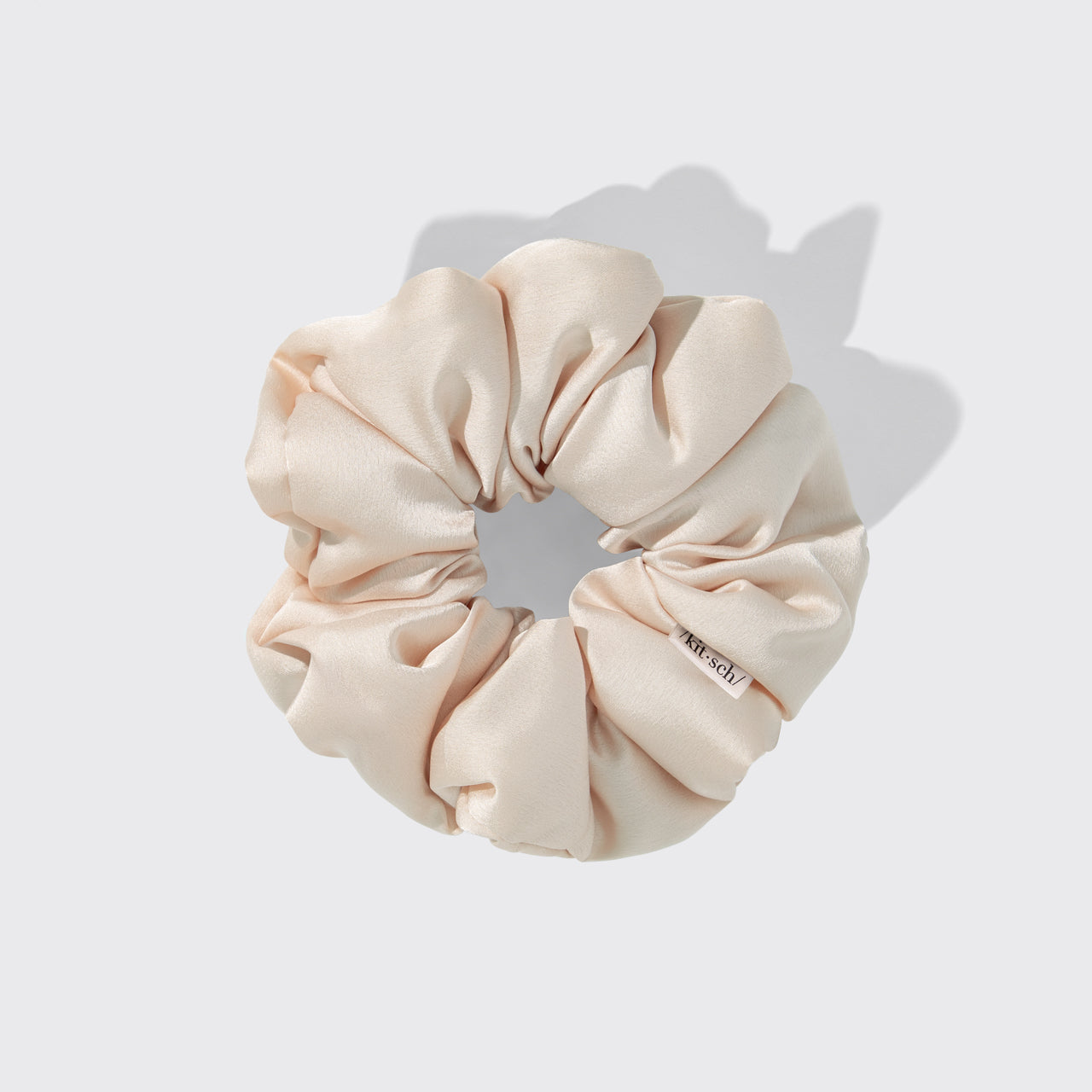 KITSCH Pillow Scrunchies® in Satin 4pc - Blush — styled — blush satin scrunchie holding hair in place — soft enough to sleep on, cute enough to wear out