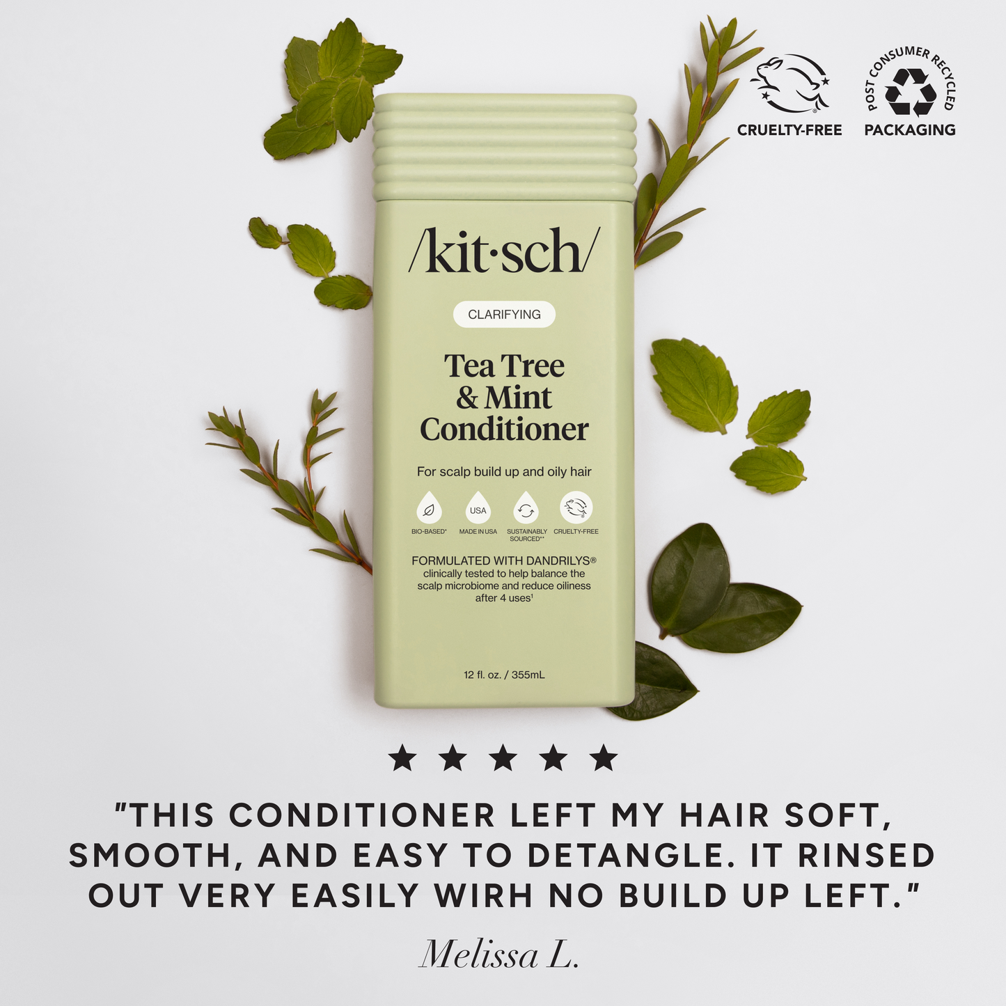 Kitsch Tea Tree & Mint Conditioner packaging with green leaves on a white background