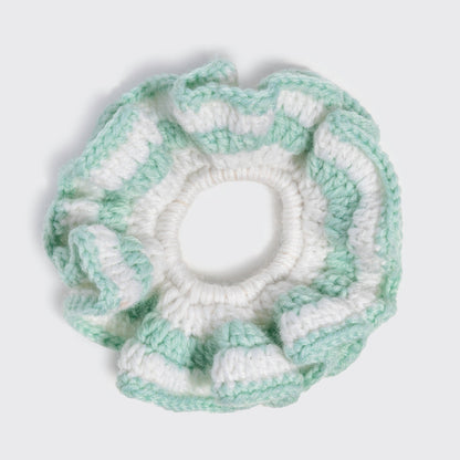 KITSCH Coastal Cottage Crochet Scrunchie in sage green and white, flat lay overhead view showing textured crochet detail