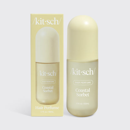 Kitsch Coastal Sorbet Hair & Body Perfume Mist bottle on a soft warm background