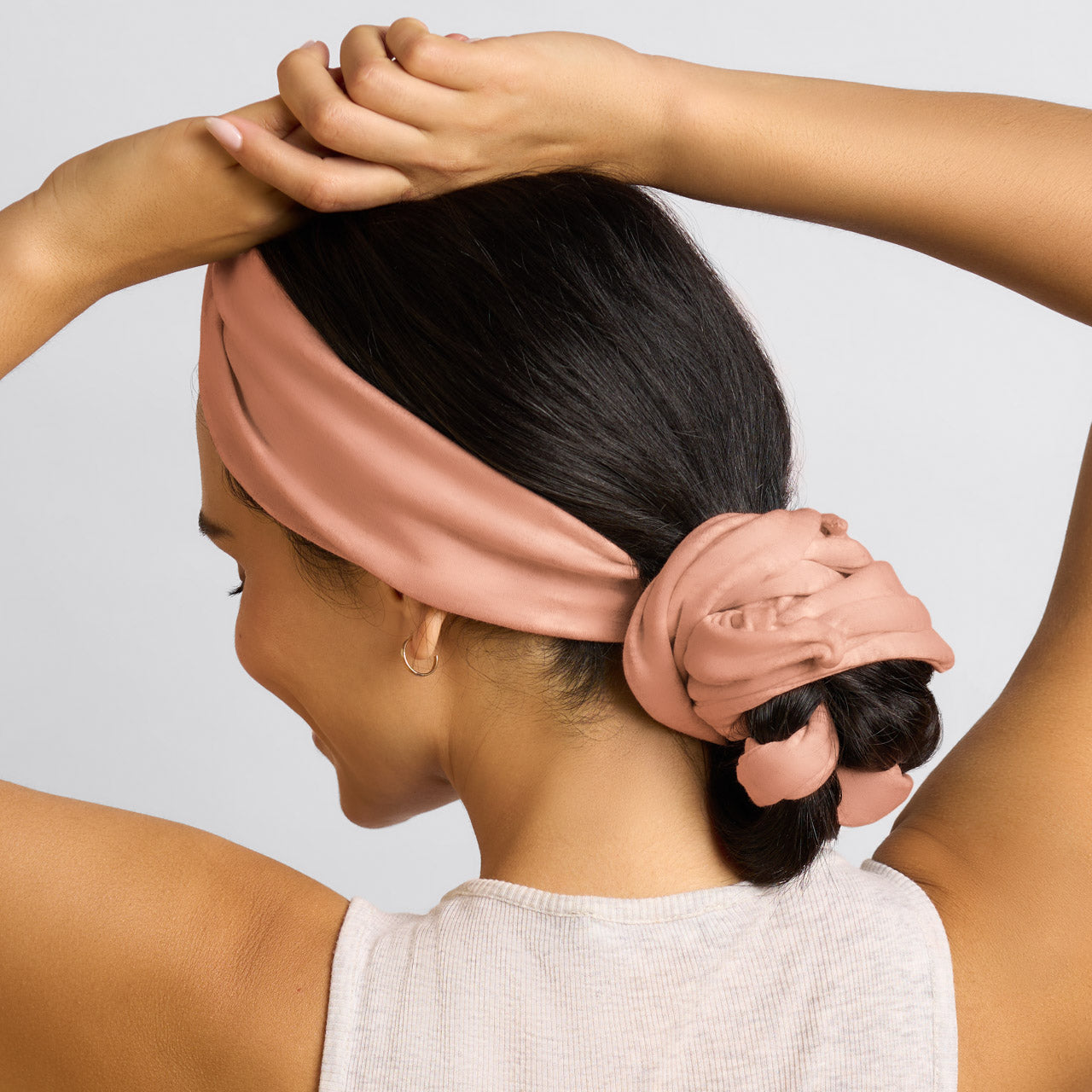 KITSCH Set & Flow Active Headband in Terracotta — model wearing terracotta set & flow headband — soft, stretchy design protects curls and waves overnight