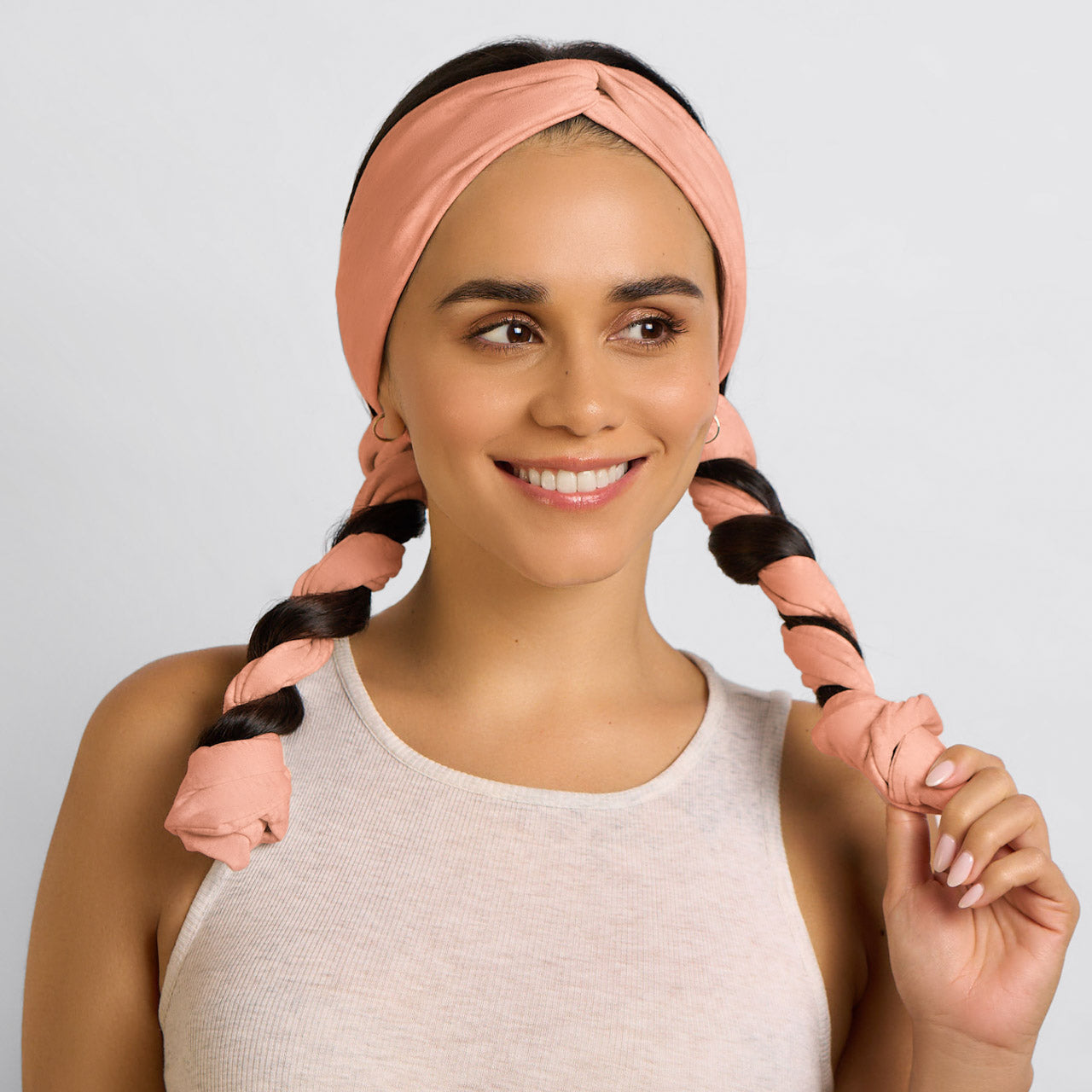 KITSCH Set & Flow Active Headband in Terracotta — lifestyle model shot with set & flow terracotta headband — snag-free fabric is gentle on all hair types and textures