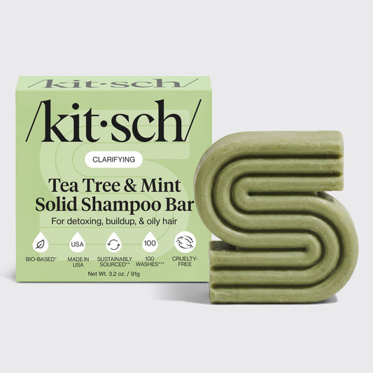 KITSCH Tea Tree & Mint Clarifying Solid Shampoo Bar with packaging box on white background — labeled CLARIFYING, For detoxing, buildup, & oily hair — sulfate-free clarifying shampoo bar that reduces oiliness and visible flakes with Dandrilys® and tea tree & mint blend