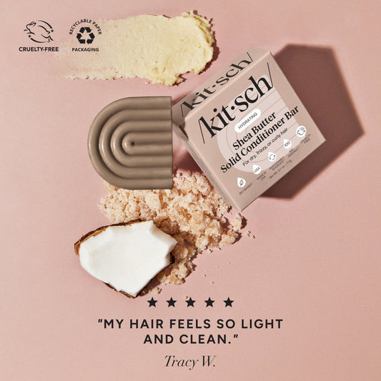 KITSCH Shea Butter Hydrating Solid Conditioner Bar — ingredient flat lay on dusty pink background with shea butter chunks and coconut — 5-star review: MY HAIR FEELS SO LIGHT AND CLEAN. — Tracy W. — Cruelty-Free | Recyclable Paper Packaging — Richly hydrates dry, thirsty strands — Seals in essential moisture to help tame unwanted frizz