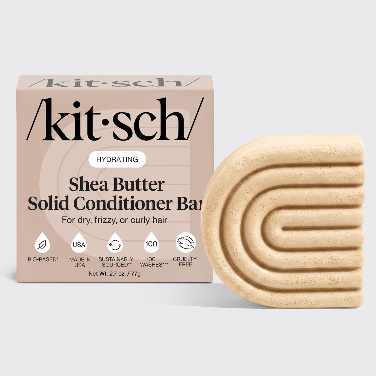 KITSCH Shea Butter Hydrating Solid Conditioner Bar — hero product shot on light gray background — HYDRATING Shea Butter Solid Conditioner Bar retail box with bar — For dry, frizzy, or curly hair — Bio-based | Made in USA | Sustainably Sourced | 100 Washes | Cruelty-Free — Net Wt. 2.7 oz / 77g — Richly hydrates dry, thirsty strands — Seals in essential moisture to help tame unwanted frizz